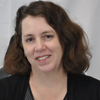 Dr. Meg Kapil